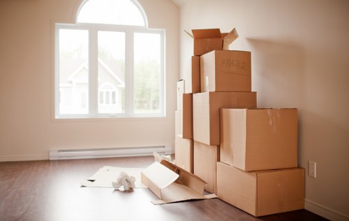 Local Fitzrovia man with a van preparing careful furniture delivery
